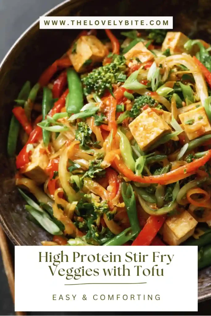 Healthy High Protein Stir Fry Veggies with Tofu featuring smoked tofu, edamame, napa cabbage, and bell peppers tossed with noodles. This plant-based stir fry is vibrant, fresh, and packed with protein.