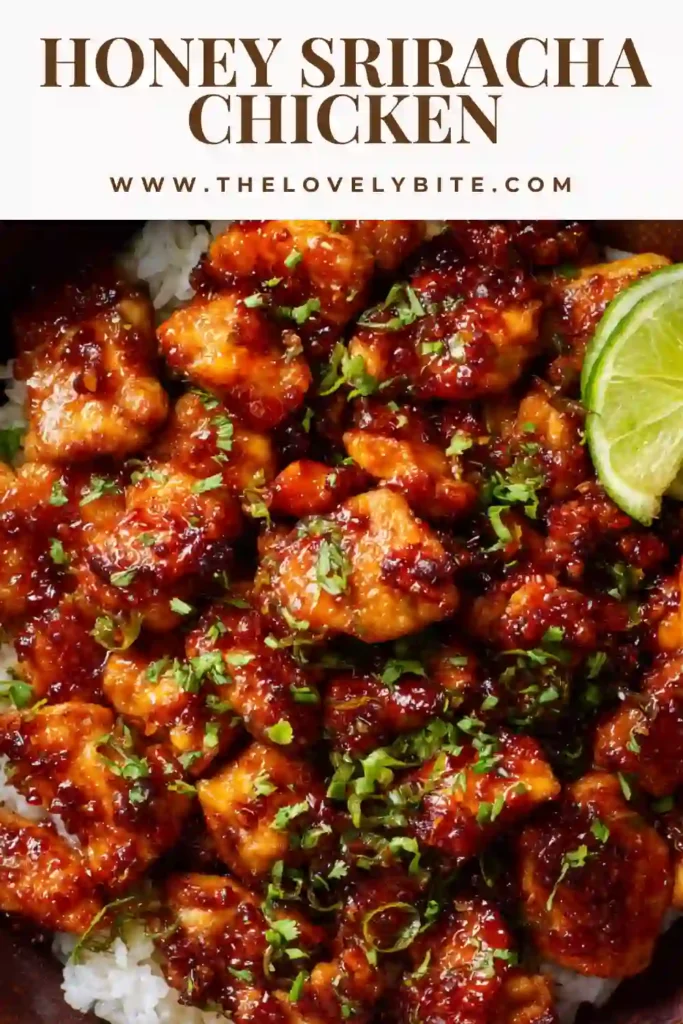 Sticky Honey Sriracha Chicken baked until caramelized and golden brown. This easy chicken dinner is served with rice and steamed vegetables for a comforting meal.