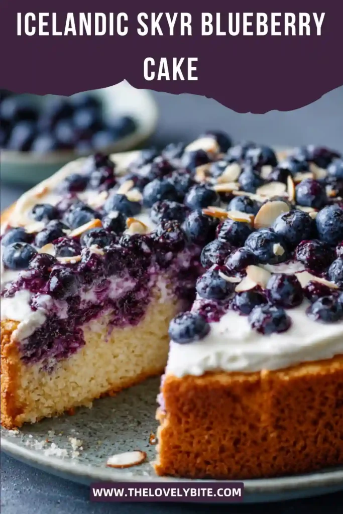 Homemade Icelandic Skyr Blueberry Cake decorated with blueberries and toasted almonds. The creamy skyr cheesecake filling sits on a crisp buttery graham crust.