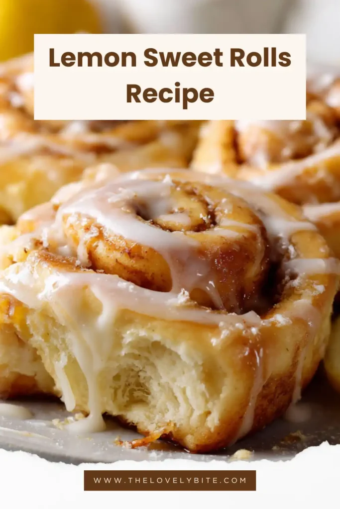 Freshly baked Lemon Sweet Rolls topped with cream cheese frosting and lemon curd in a baking pan. The rolls are soft, golden, and filled with sweet citrus flavor.