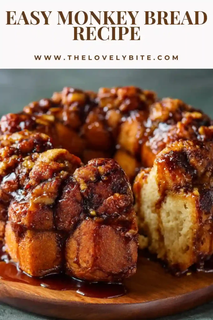 Close-up of homemade Monkey Bread baked in a Bundt pan with cinnamon sugar biscuit dough and rich brown sugar sauce. Warm pull-apart bread pieces are topped with walnuts and raisins.