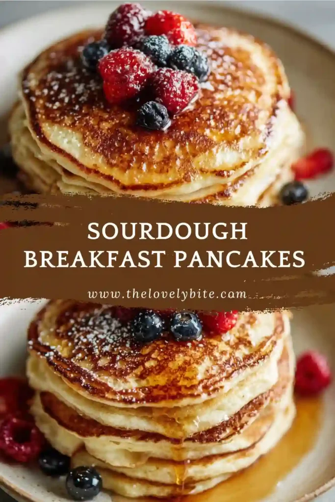 Fluffy sourdough breakfast pancakes stacked with maple syrup and fresh berries on top, showing soft texture and golden edges.