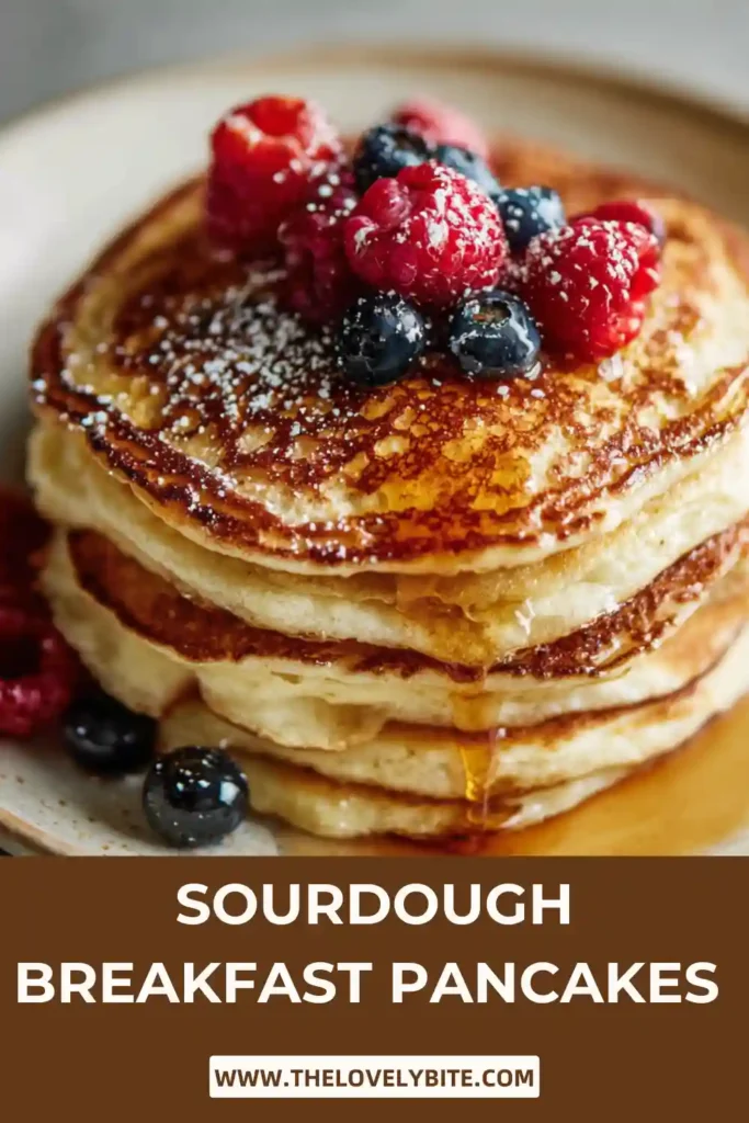 Close-up of sourdough breakfast pancakes with butter melting and syrup drizzling, highlighting airy interior.