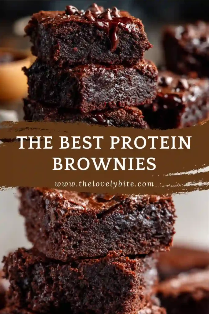 Chocolate protein brownies stacked on a serving plate with a rich, dense texture and melted chocolate throughout. These almond butter brownies are perfect for healthy snacking.