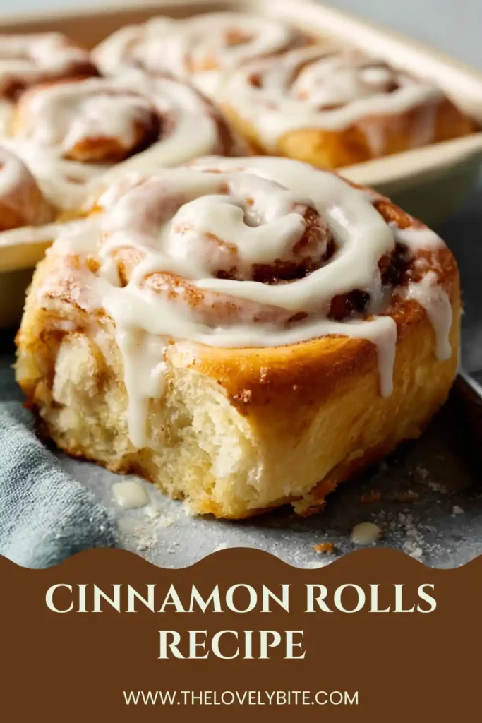 Homemade Cinnamon Rolls arranged in a baking pan with thick vanilla cream cheese glaze. These bakery-style cinnamon rolls are soft, sweet, and comforting.