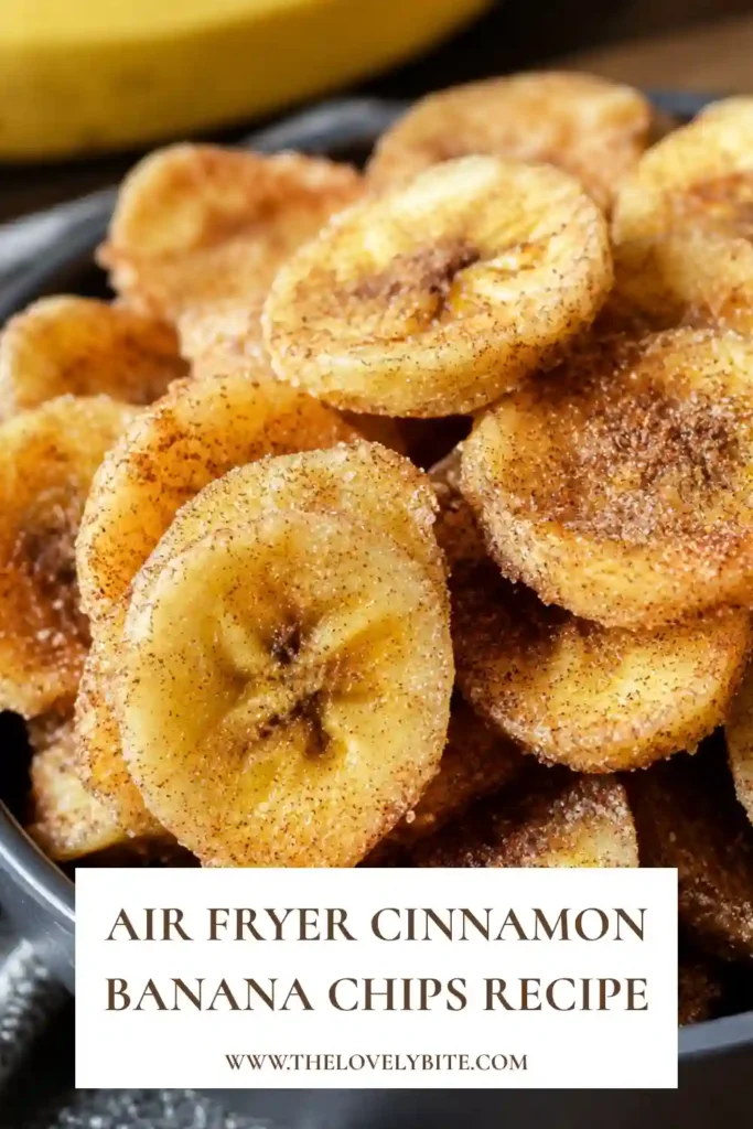 Homemade cinnamon banana chips arranged in a serving bowl after cooking in the air fryer. The chips are golden brown, crunchy, and lightly dusted with cinnamon sugar.