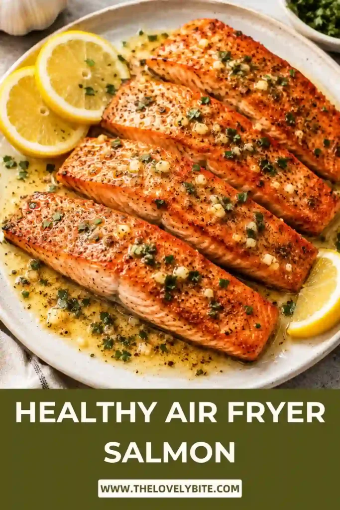 Close-up of juicy Air Fryer Salmon topped with buttery lemon garlic sauce. Perfect for an easy family dinner.