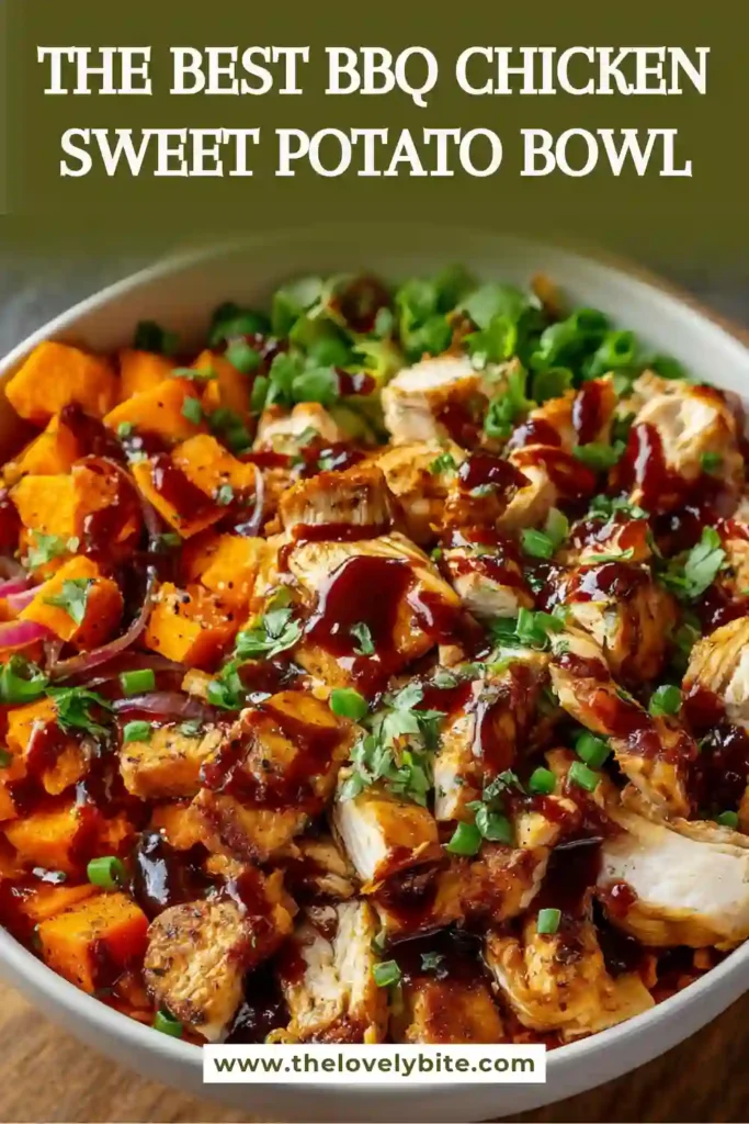 A BBQ Chicken Sweet Potato Bowl topped with roasted sweet potatoes, tender barbecue chicken, avocado, black beans, and fresh cilantro. This healthy bowl is colorful, nutritious, and perfect for meal prep.