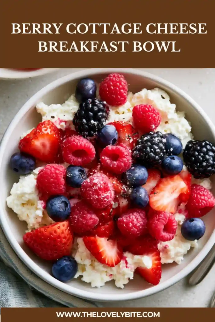 Protein breakfast bowl with cottage cheese and mixed berries served in a white bowl.