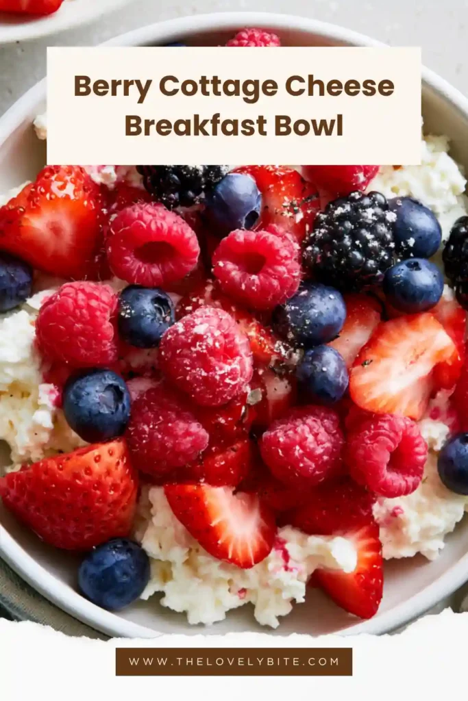 Berry Cottage Cheese Breakfast Bowl topped with strawberries, blueberries, raspberries, blackberries, and almonds.