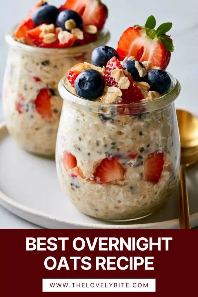 A jar of creamy overnight oats topped with fresh strawberries, blueberries, and chia seeds. This healthy make-ahead breakfast is perfect for busy mornings.