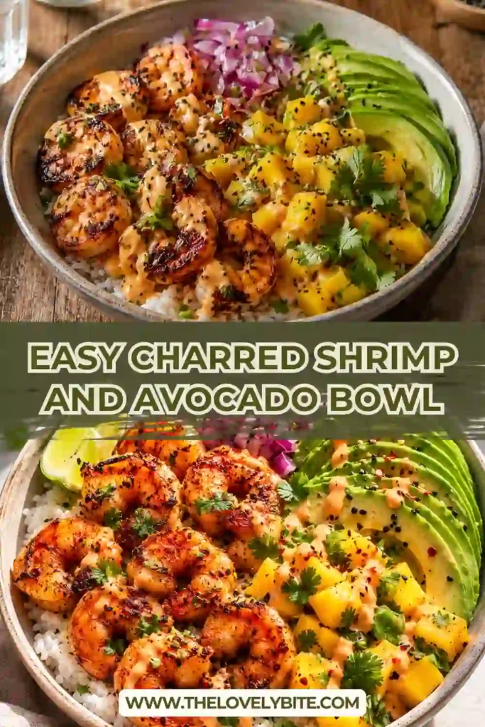 A Charred Shrimp and Avocado Bowl filled with smoky shrimp, creamy avocado slices, mango salsa, and fluffy white rice. The bowl is finished with a drizzle of spicy lime sauce and black sesame seeds.