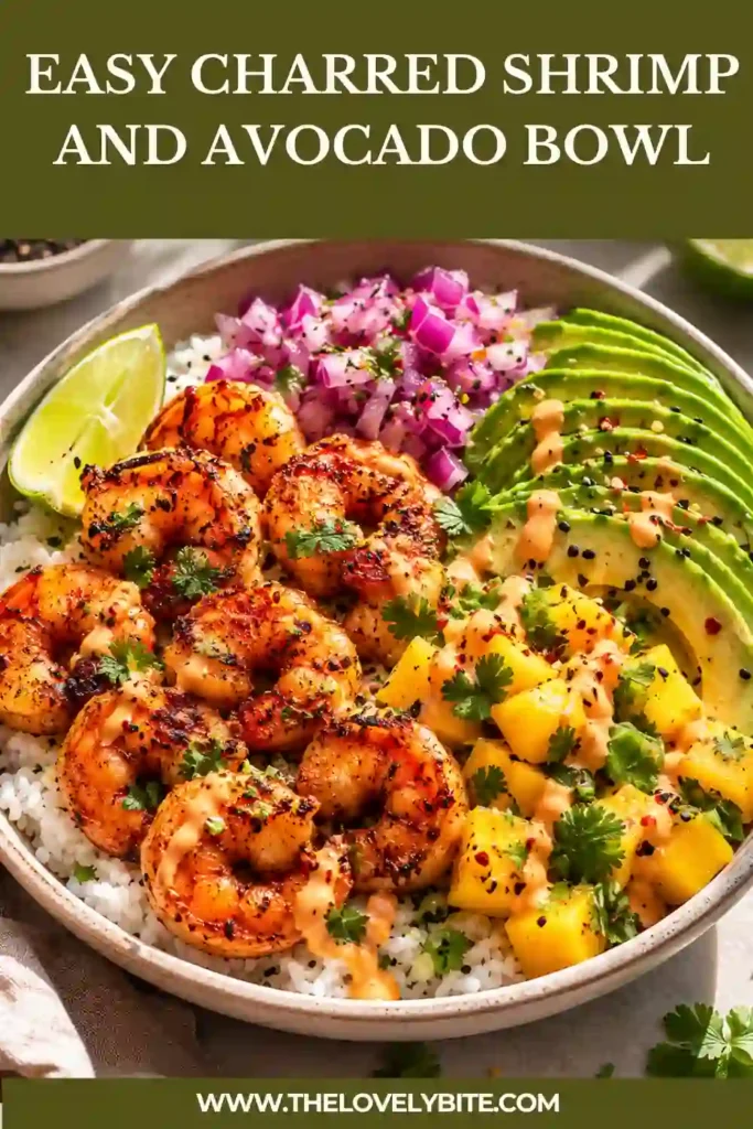 Healthy avocado shrimp bowl topped with smoky shrimp, tropical mango salsa, and zesty lime-chili sauce. Served over fluffy rice for a balanced and satisfying dinner.