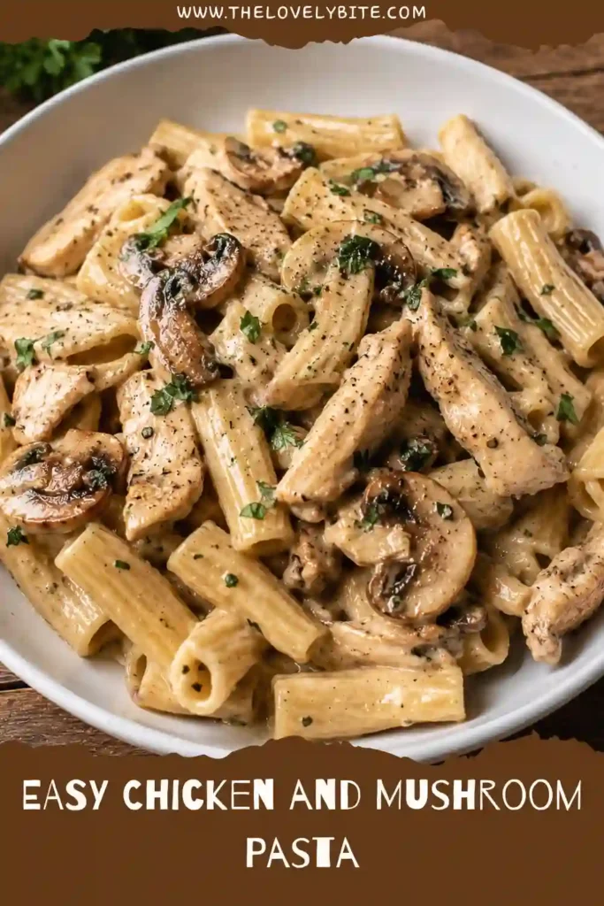 Close-up of Chicken and Mushroom Pasta in a creamy herb sauce garnished with fresh parsley. A comforting pasta meal made with simple ingredients.