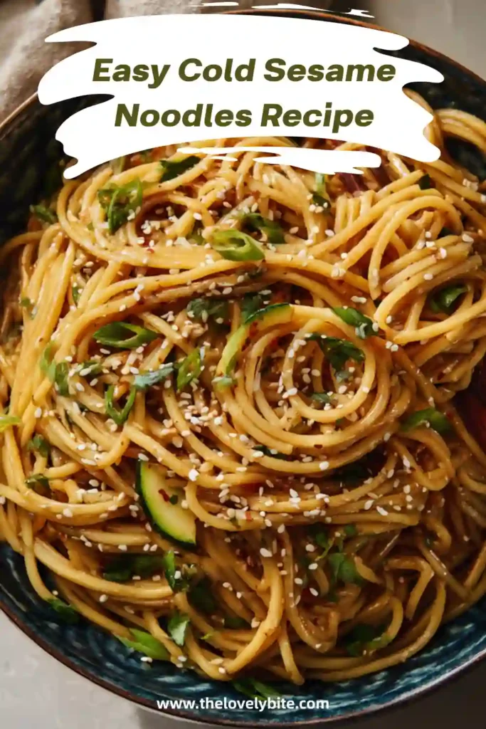 A bowl of Cold Sesame Noodles tossed in a savory sesame sauce and topped with fresh cucumber, scallions, and cilantro. This chilled noodle dish is colorful, refreshing, and perfect for summer meals.