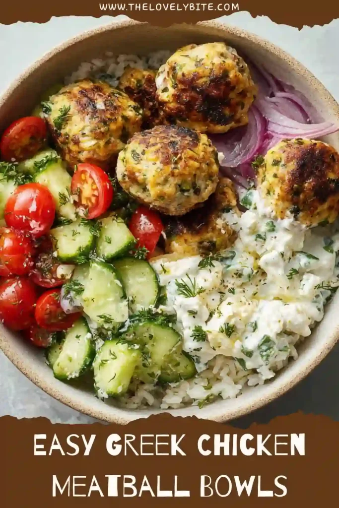 Homemade Greek chicken meatballs served in a rice bowl with cucumber salad and creamy yogurt dressing. A healthy and satisfying Mediterranean recipe.