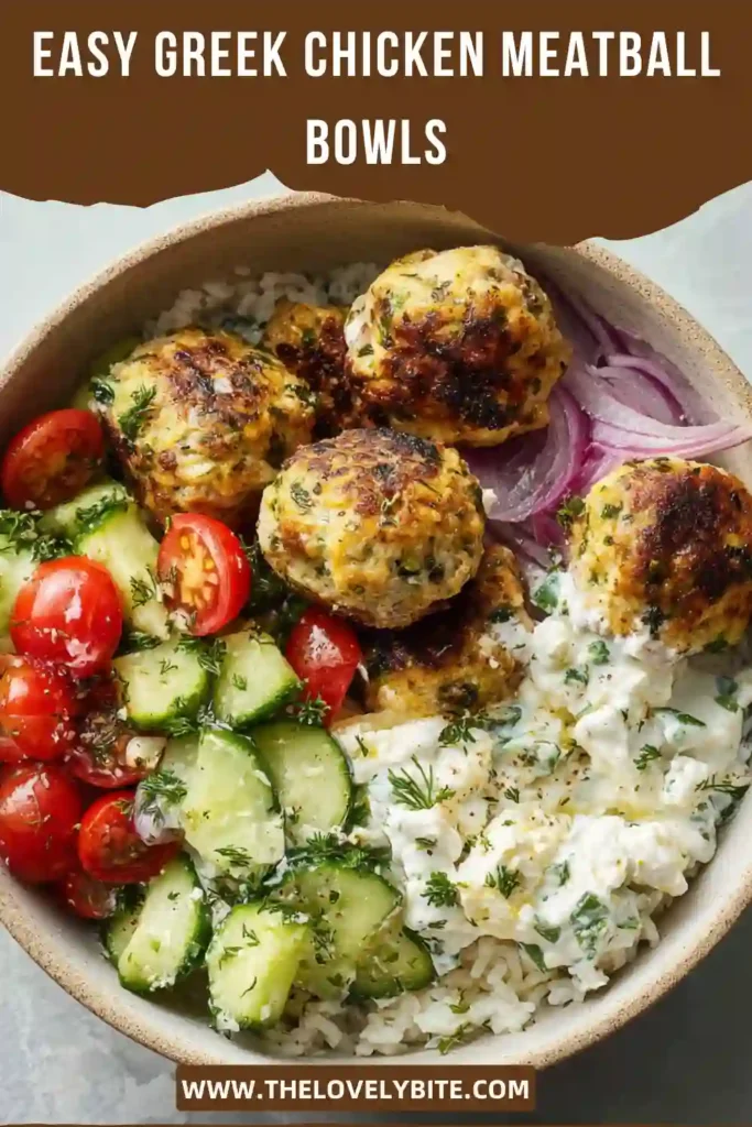 Mediterranean chicken meatball bowl served with fresh cucumber salad, tomatoes, herbs, and Greek yogurt dressing. A wholesome and protein-rich family dinner.