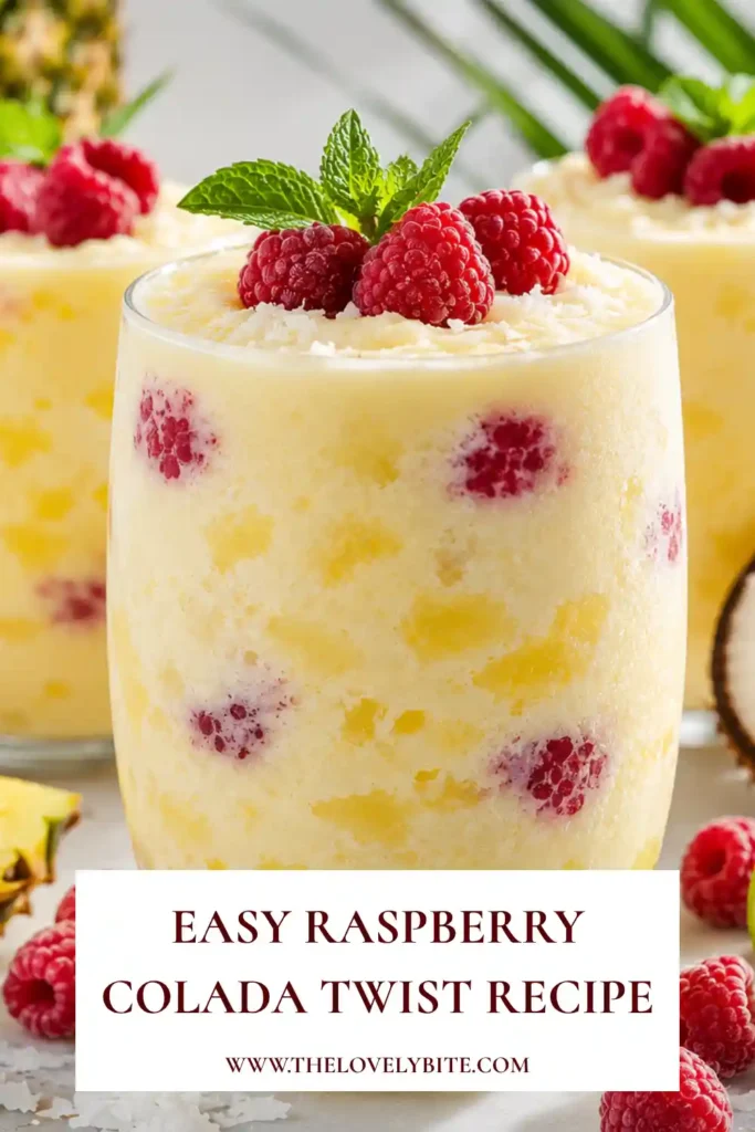 Refreshing raspberry colada served in a chilled glass with fresh fruit garnish. The drink combines pineapple, coconut, and raspberries for a tropical experience.