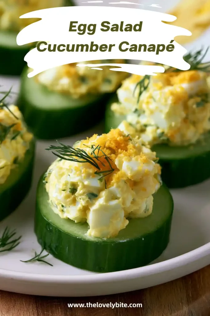 Healthy cucumber appetizer featuring egg salad, celery, Dijon mustard, and fresh herbs.