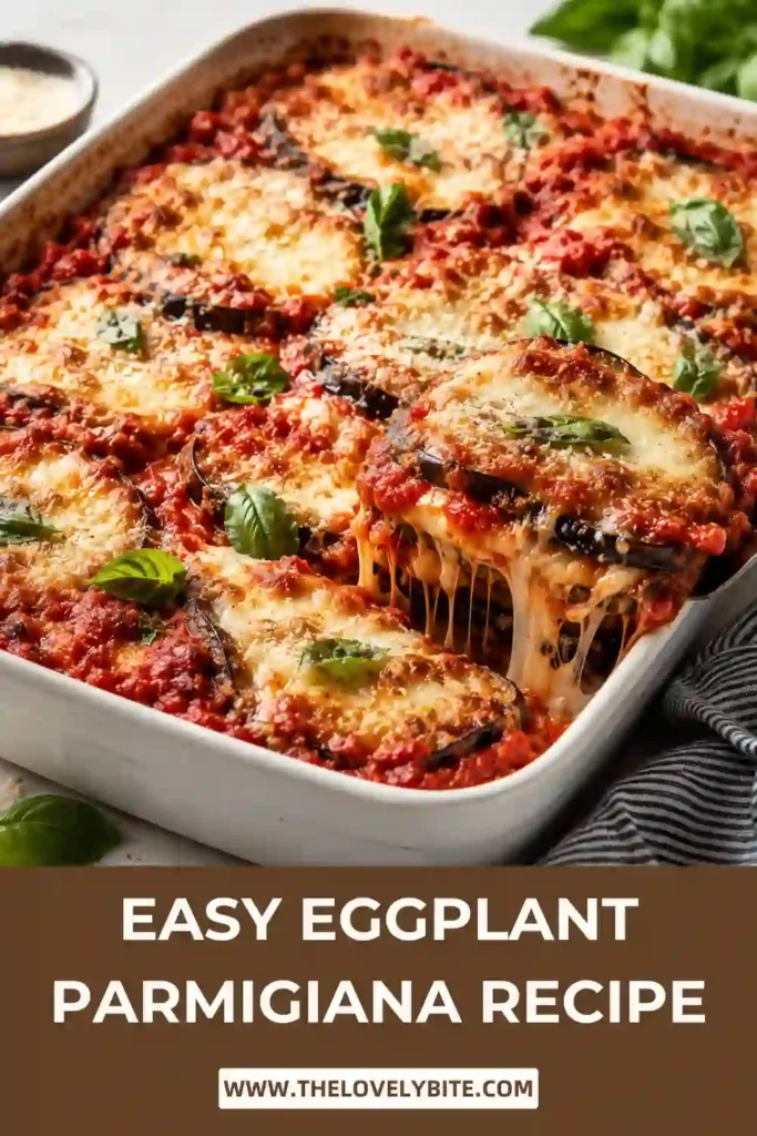 Classic Italian Eggplant Parmigiana served in a baking dish with melted mozzarella and rich tomato sauce. Tender roasted eggplant creates a hearty vegetarian meal.