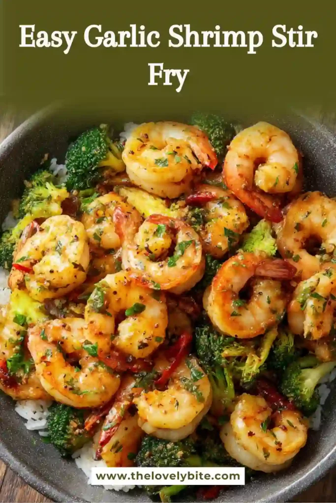 Freshly cooked shrimp zucchini stir fry served warm with garlic, butter, and lemon juice. The dish is packed with protein and vibrant flavors.