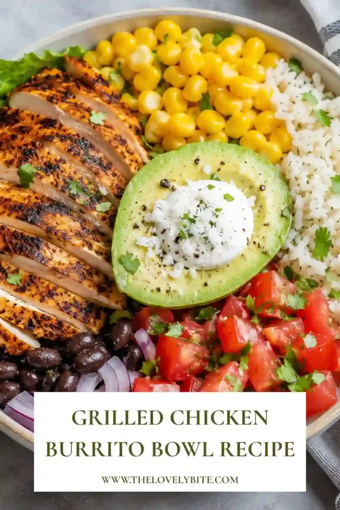 Close-up of a Grilled Chicken Burrito Bowl with tender chicken slices, fresh vegetables, creamy avocado, and black beans. A satisfying high-protein recipe with fresh ingredients.