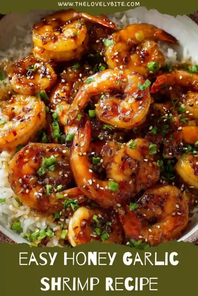 Freshly cooked Honey Garlic Shrimp in a skillet garnished with chopped green onions. The sauce creates a rich coating that pairs perfectly with rice and vegetables.