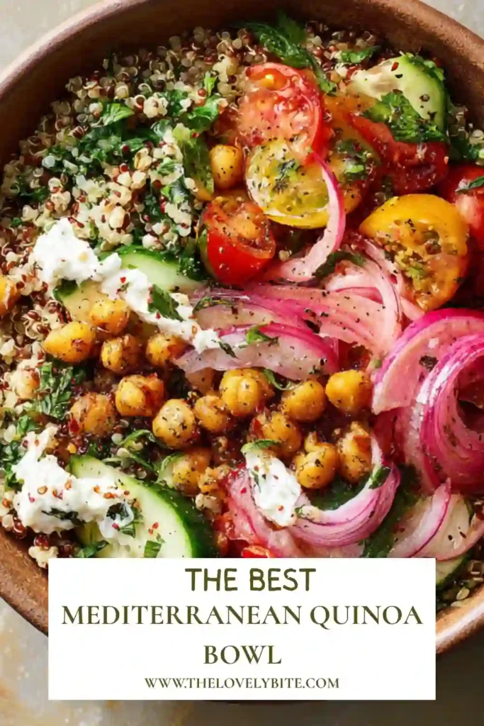 Fresh Mediterranean quinoa bowl served with crispy chickpeas, diced avocado, tomatoes, cucumbers, and garlic yogurt sauce. A wholesome vegetarian lunch recipe.