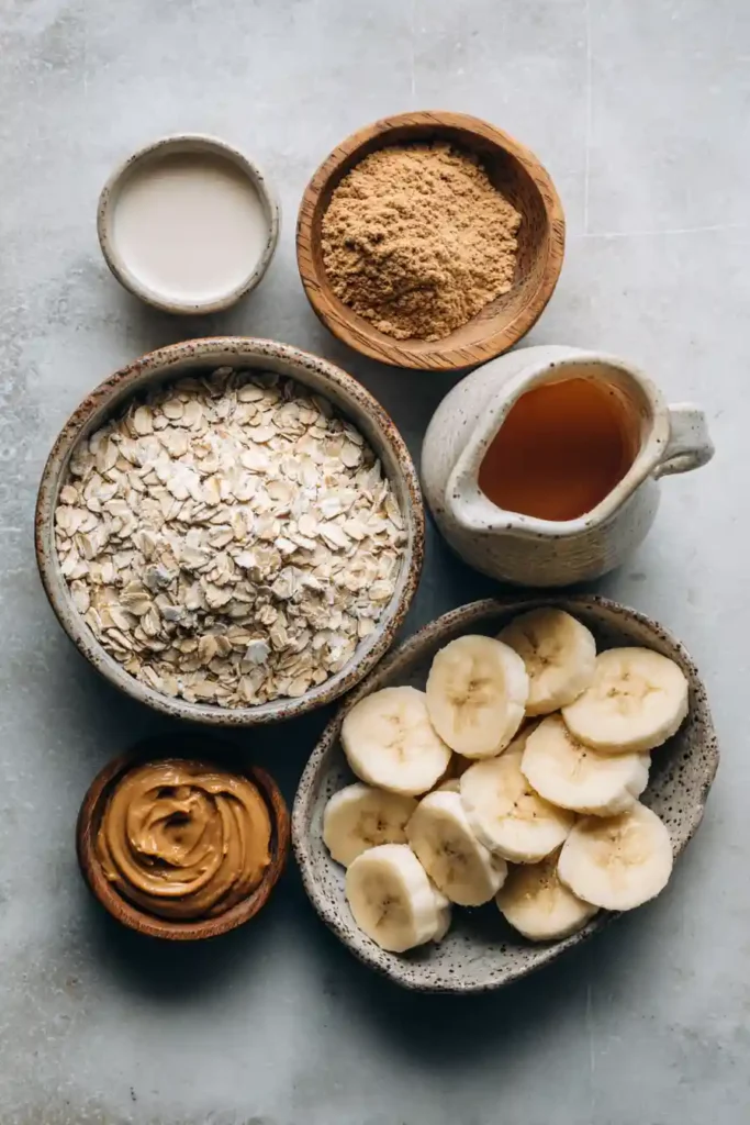 Homemade protein oats with peanut butter flavor and sliced banana topping. A quick and easy vegan breakfast packed with wholesome ingredients.