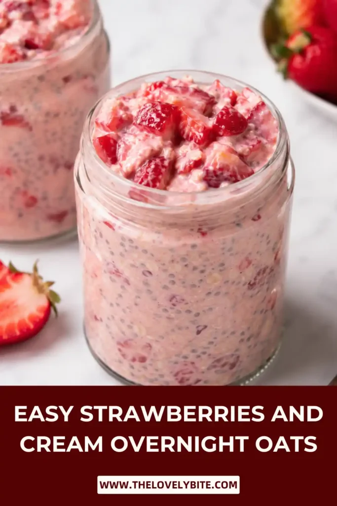 Close-up view of creamy strawberry overnight oats topped with fresh fruit in a mason jar. This healthy breakfast recipe features oats, chia seeds, and Greek yogurt.