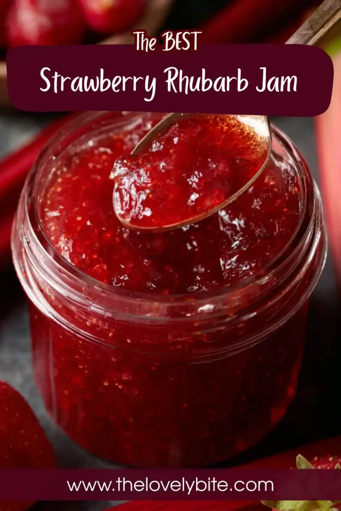 Freshly canned Strawberry Rhubarb Jam displayed in glass jars after processing. This easy homemade jam recipe combines strawberries, rhubarb, and pectin for a delicious spread.