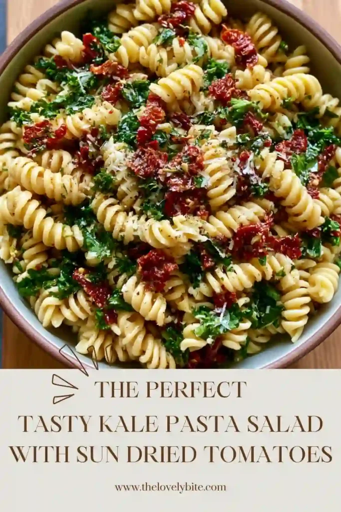 Mediterranean-inspired kale pasta salad served in a large bowl with feta cheese, pine nuts, and basil dressing. A wholesome meal prep-friendly recipe.