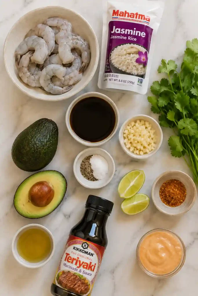 A bowl of Teriyaki Shrimp Rice Bowls topped with juicy shrimp, sliced avocado, and fresh cilantro over fluffy jasmine rice. The sweet and savory teriyaki glaze creates a vibrant and flavorful meal.