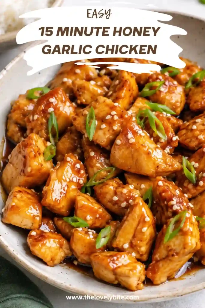 Freshly cooked honey garlic chicken served with brown rice and lime wedges on a white plate. This healthy chicken dinner is colorful, flavorful, and satisfying.
