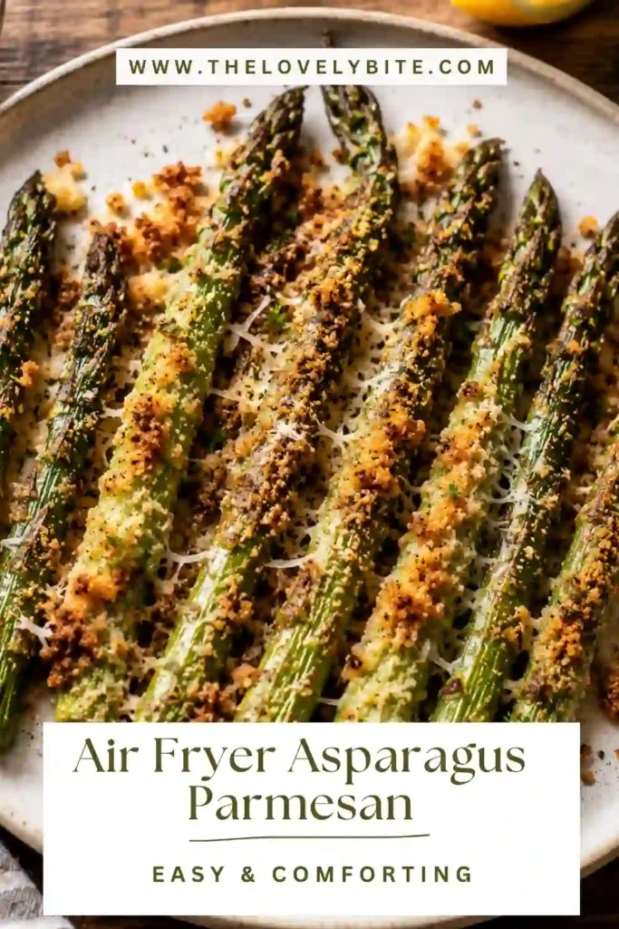 Close-up of Air Fryer Asparagus Parmesan with crisp-tender asparagus spears and melted Parmesan cheese. This low carb asparagus recipe is simple and flavorful.