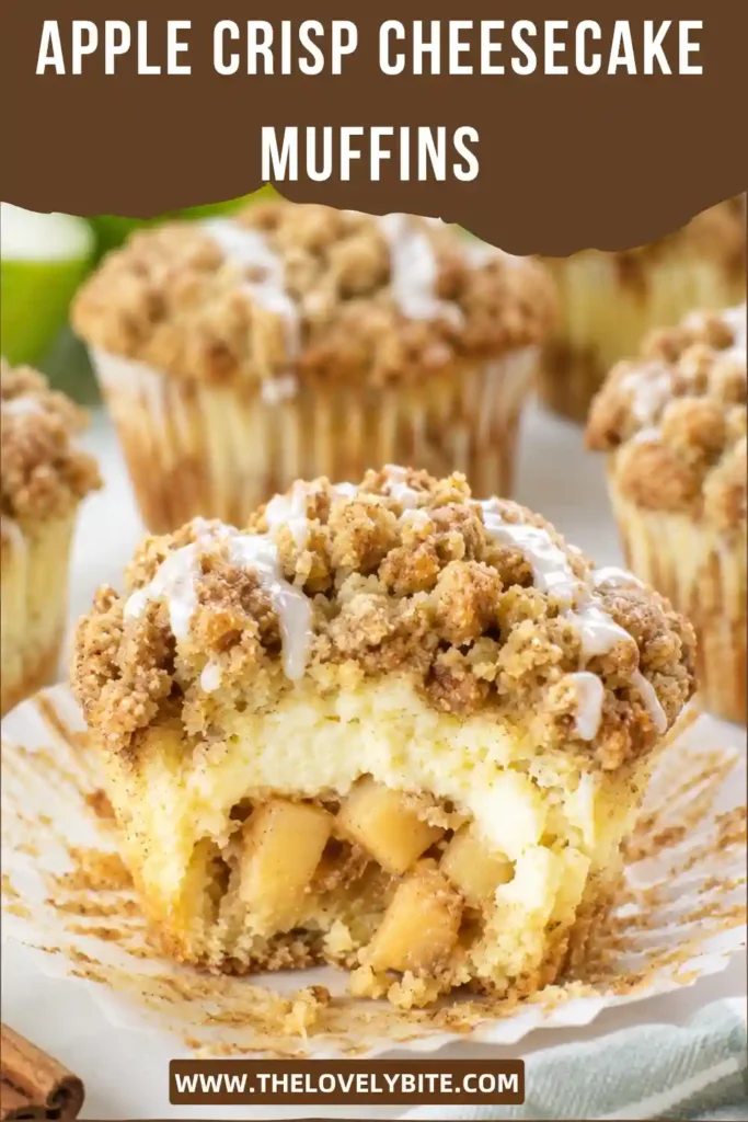 Golden Apple Crisp Cheesecake Muffins with a crunchy cinnamon streusel topping and sweet vanilla drizzle. Soft muffin layers surround rich cheesecake filling and tender apple pieces.