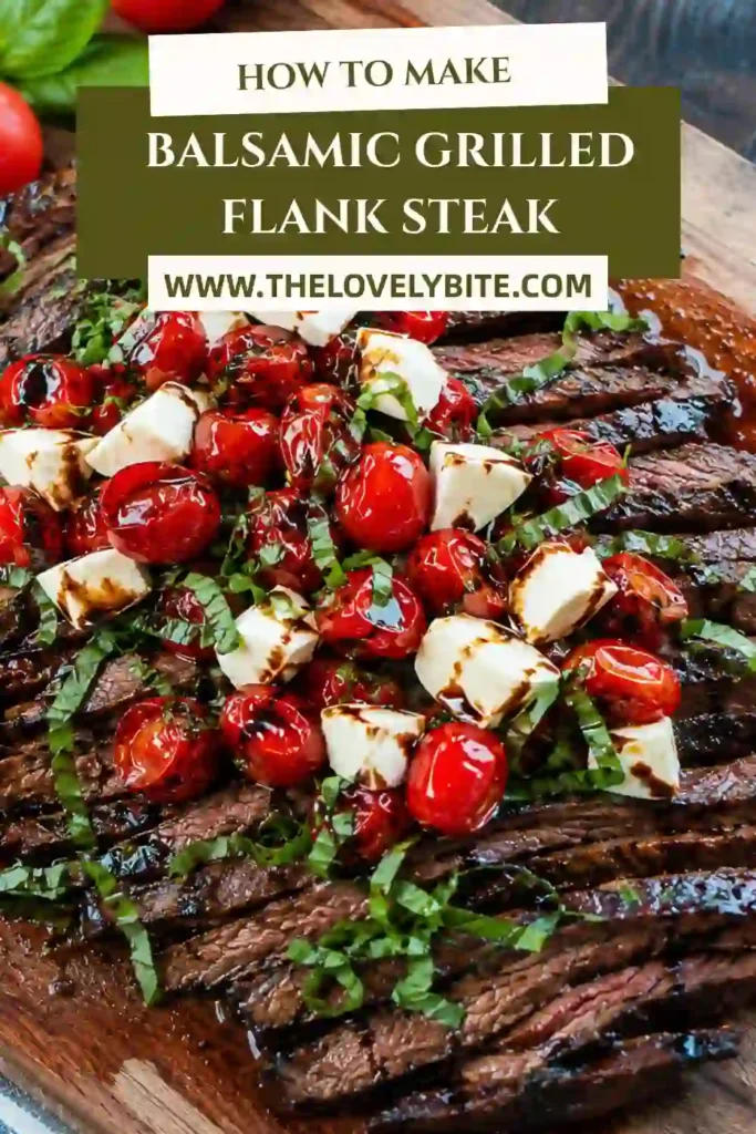 Close-up of grilled flank steak served with fresh mozzarella, basil, and charred cherry tomatoes. The balsamic glaze adds a glossy finish to this Italian-inspired steak recipe.