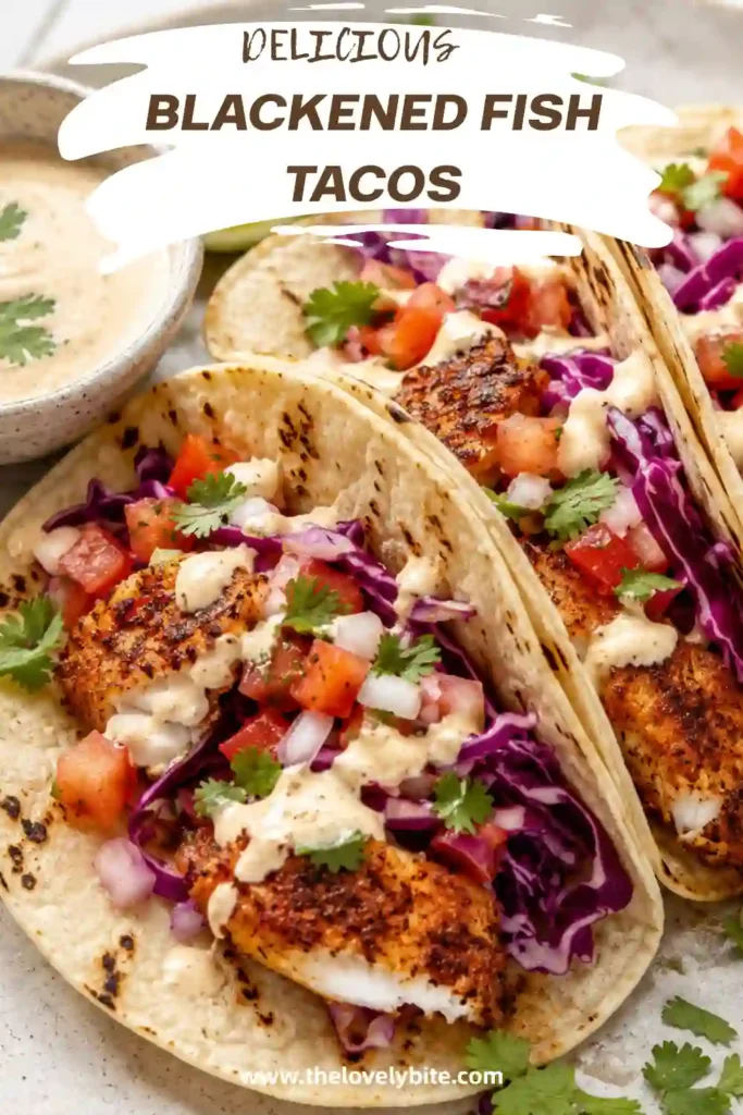 Fresh Blackened Fish Tacos served on corn tortillas with flaky cod, homemade fish taco sauce, cabbage, and lime wedges. A healthy taco recipe bursting with flavor.