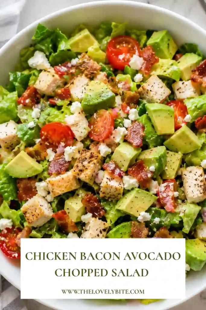 Colorful Chicken Bacon Avocado Chopped Salad with fresh vegetables, creamy avocado, turkey bacon, blue cheese, and juicy chicken tossed in homemade red wine vinaigrette. A wholesome and satisfying salad recipe.