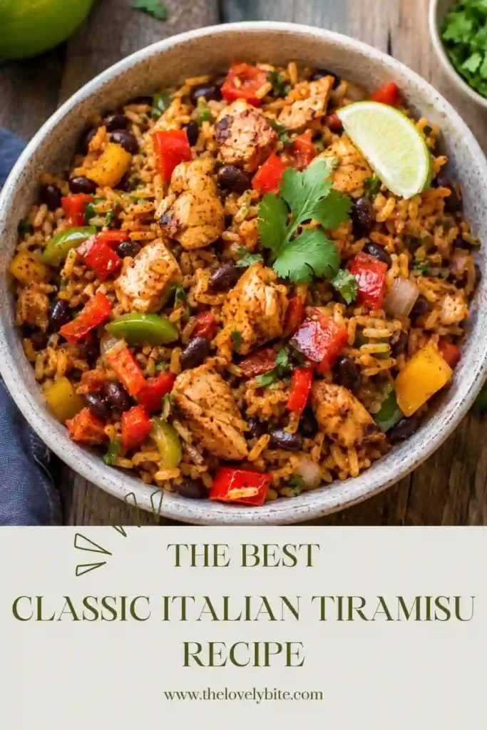 A hearty one pan Chicken Fajita Rice Bowl featuring juicy chicken, black beans, peppers, tomatoes, and brown rice garnished with cilantro.