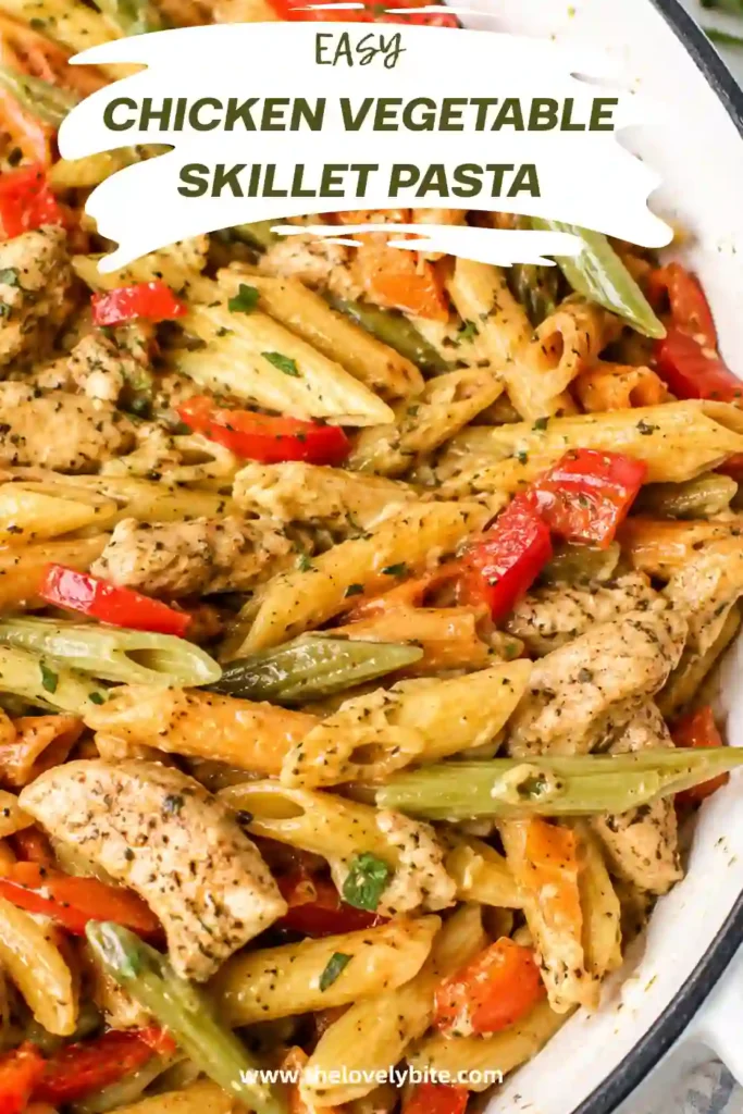 Fresh Chicken Vegetable Skillet Pasta featuring juicy chicken, red, yellow, and orange bell peppers, and perfectly cooked penne pasta. This colorful weeknight dinner is healthy and satisfying.