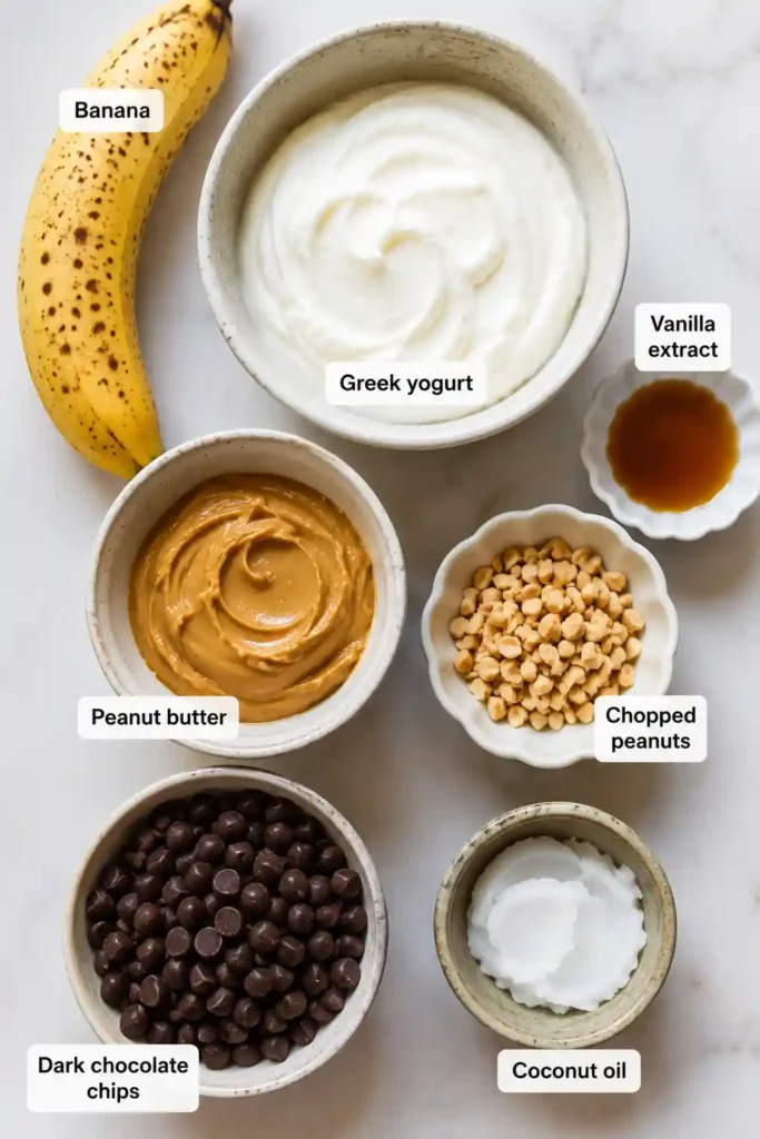 Easy no bake frozen treats made with Greek yogurt, peanut butter, banana, and dark chocolate. These chocolate yogurt desserts are perfect for summer snacking and meal prep.
