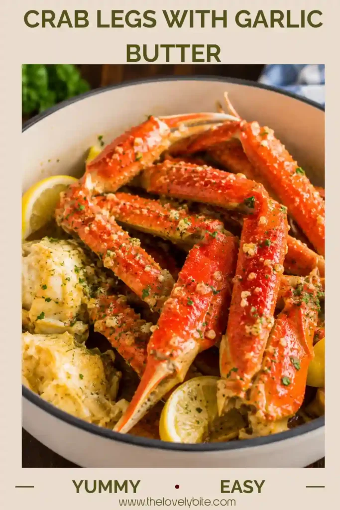 Steamed Crab Legs with Garlic Butter served on a large platter with melted butter, chopped parsley, and fresh lemon wedges. A rich seafood dinner perfect for special occasions.