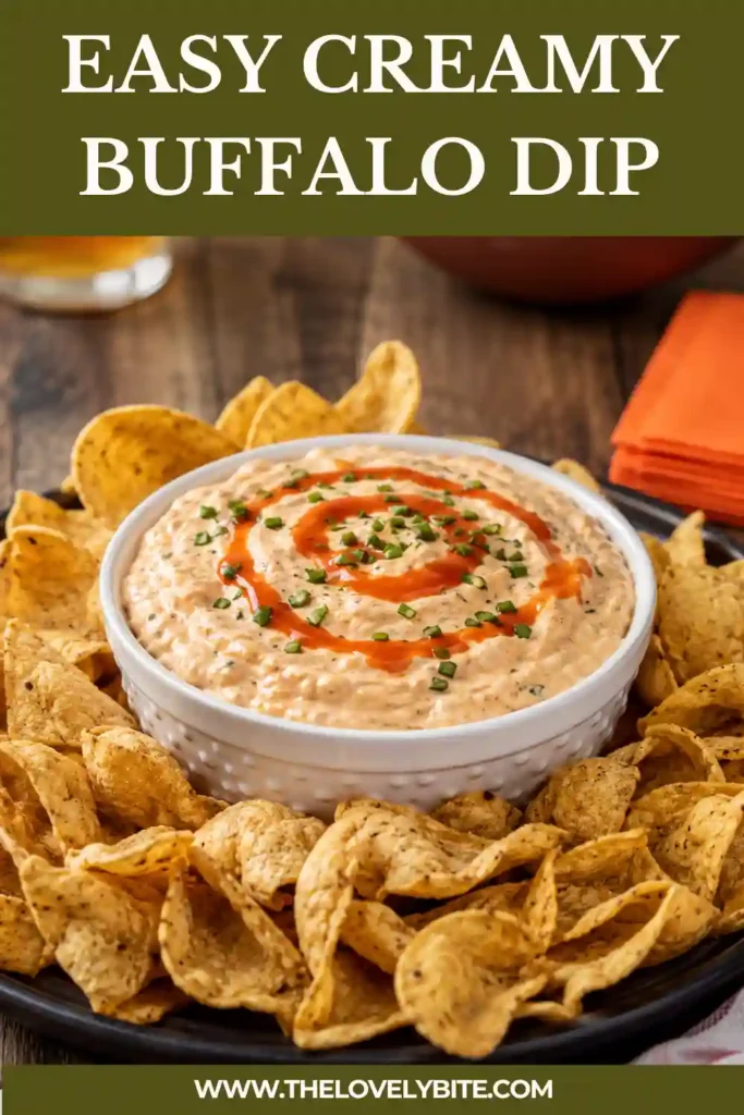 3. Rich buffalo onion dip served in a rustic bowl with crunchy vegetables and chips for dipping, photographed in soft natural light.