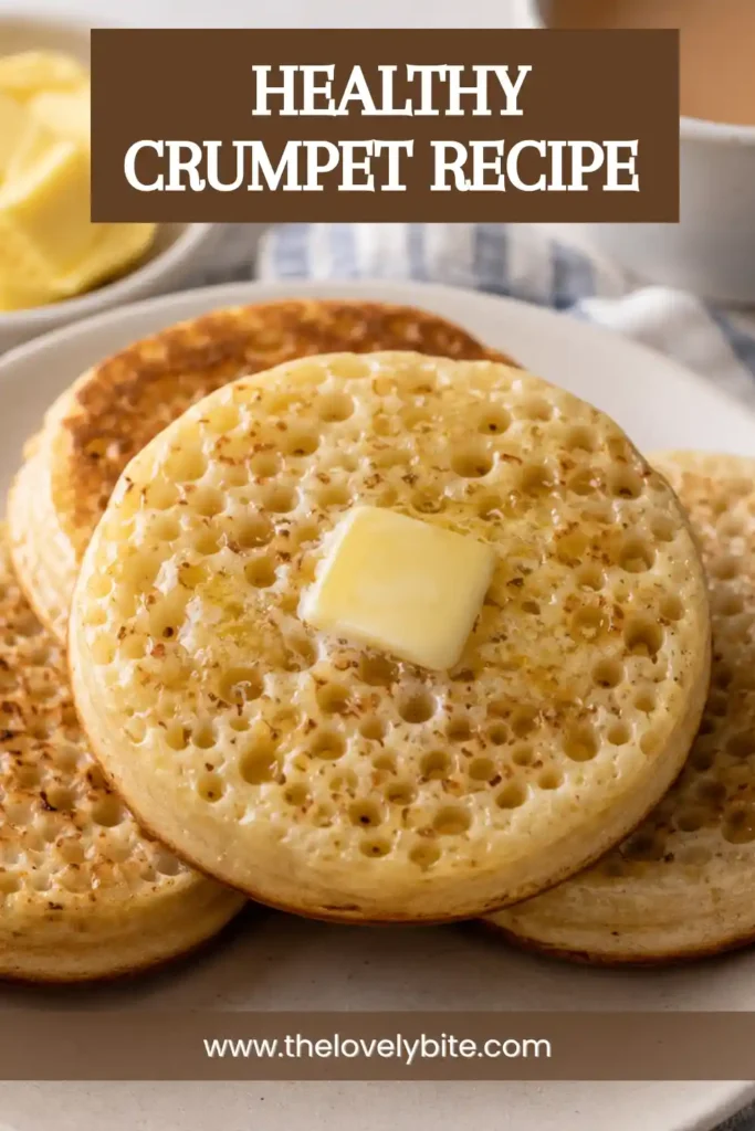 Easy homemade crumpets with airy texture and golden edges stacked on a serving plate. Perfect for breakfast or brunch.