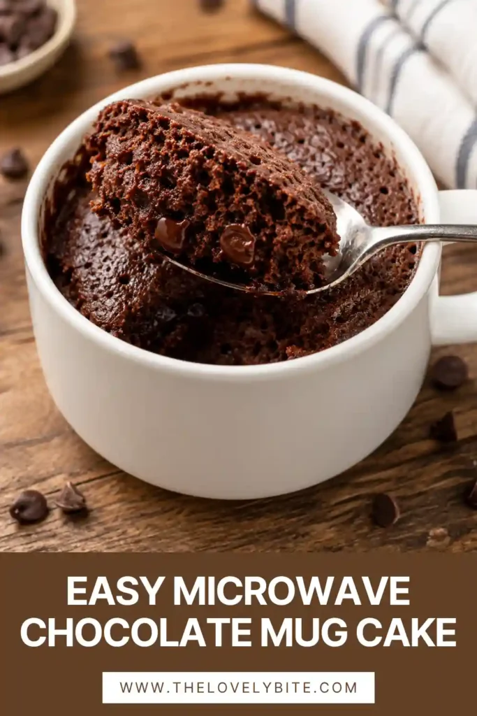 2. Fluffy microwave chocolate mug cake served in a large mug with chocolate chips and whipped cream. An easy single-serving dessert perfect for chocolate lovers.
