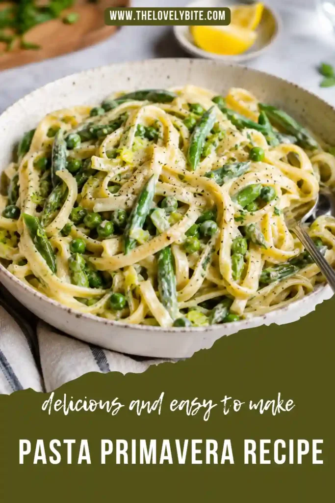 Homemade Pasta Primavera topped with grated Parmesan, parsley, and lemon zest. Fresh seasonal vegetables add color and texture to this comforting dish.