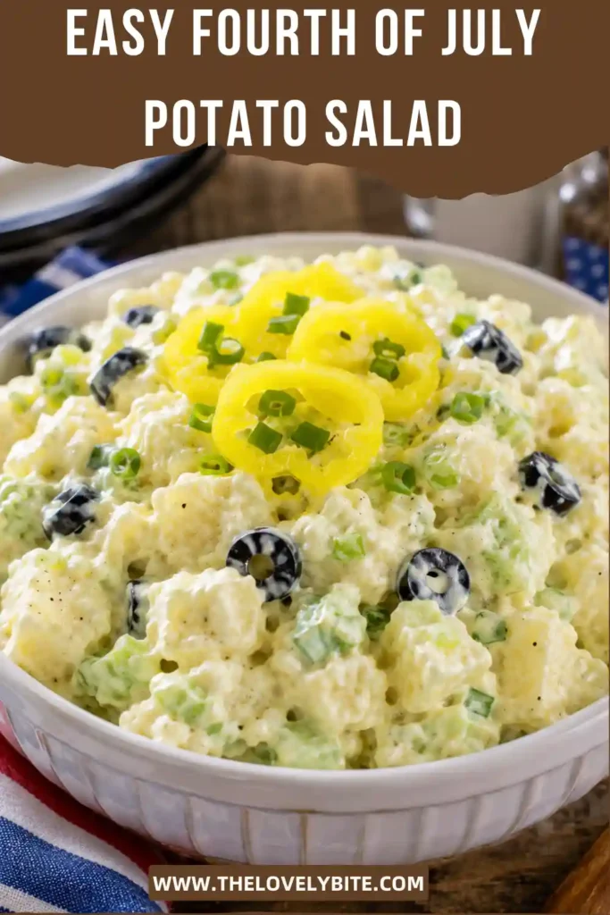 Classic Fourth of July Potato Salad with tender potatoes and a rich creamy dressing garnished for a festive picnic table. Ideal for summer celebrations and family meals.