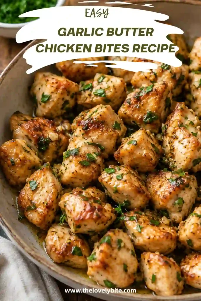 Golden Garlic Butter Chicken Bites served in a skillet with fresh parsley. Tender chicken breast pieces are coated in a rich buttery garlic sauce for an easy weeknight dinner.