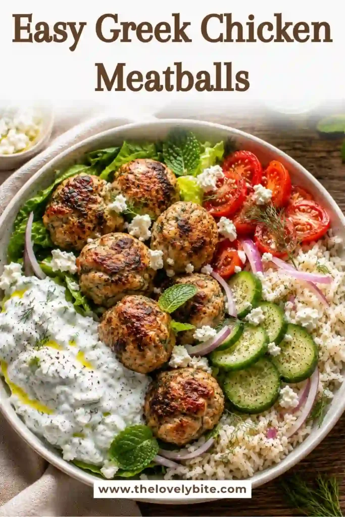 Juicy Greek Chicken Meatballs made with fresh dill, mint, garlic, and lemon zest. Served with fresh salad and homemade tzatziki for a healthy chicken meatball recipe.